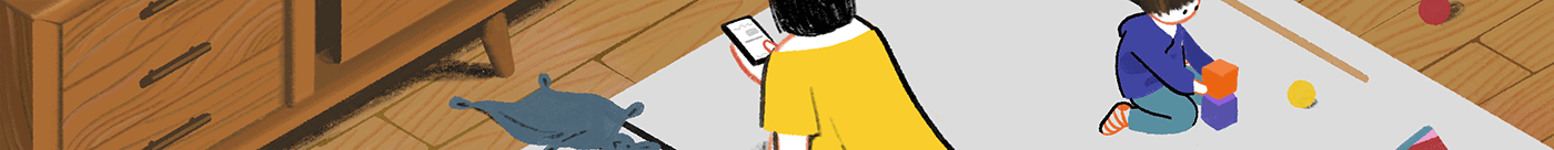 A mother scrolls through her phone while sitting next to a toddler playing with blocks.